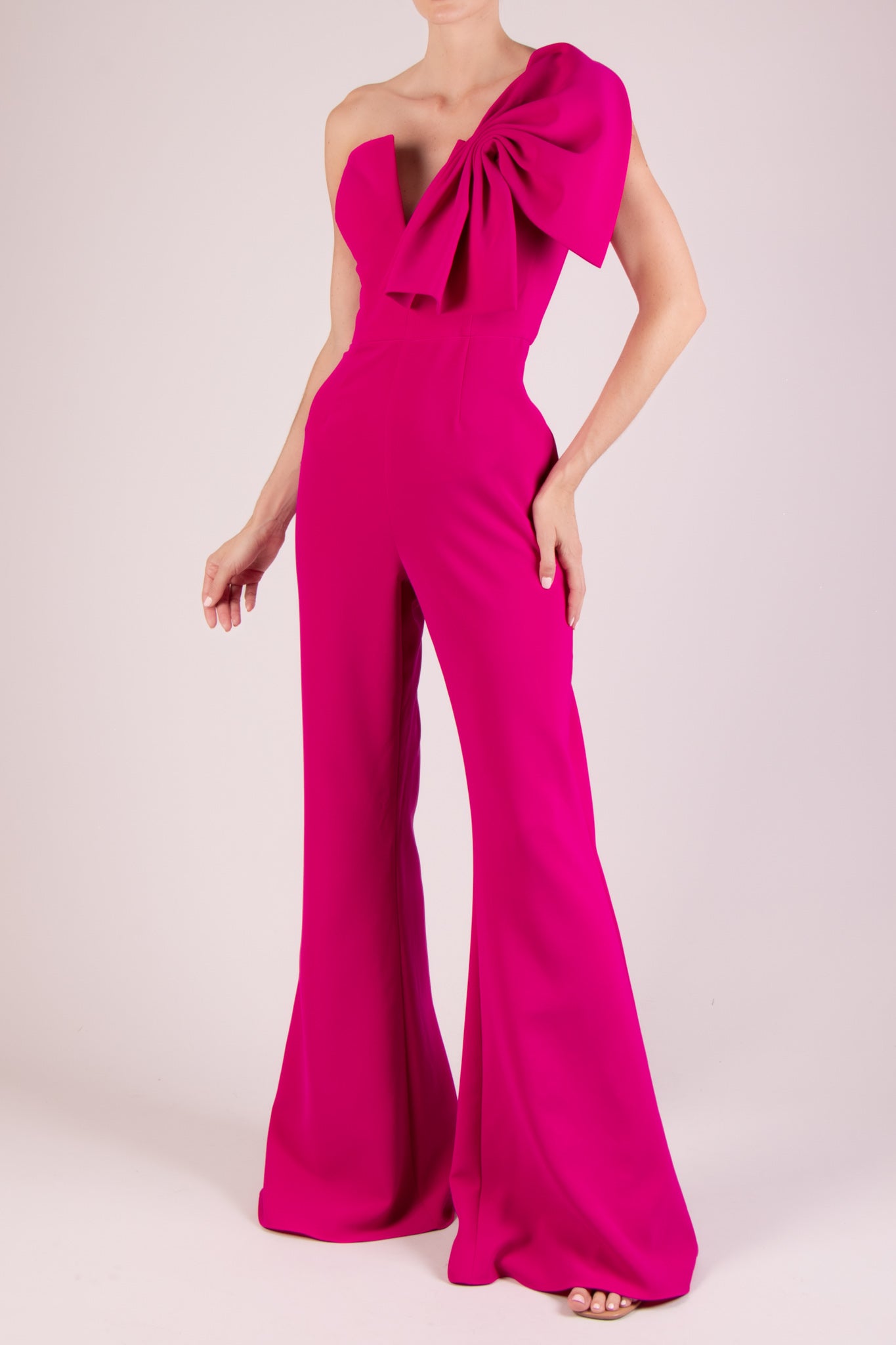 Jumpsuit detalle moño en tirante fucsia