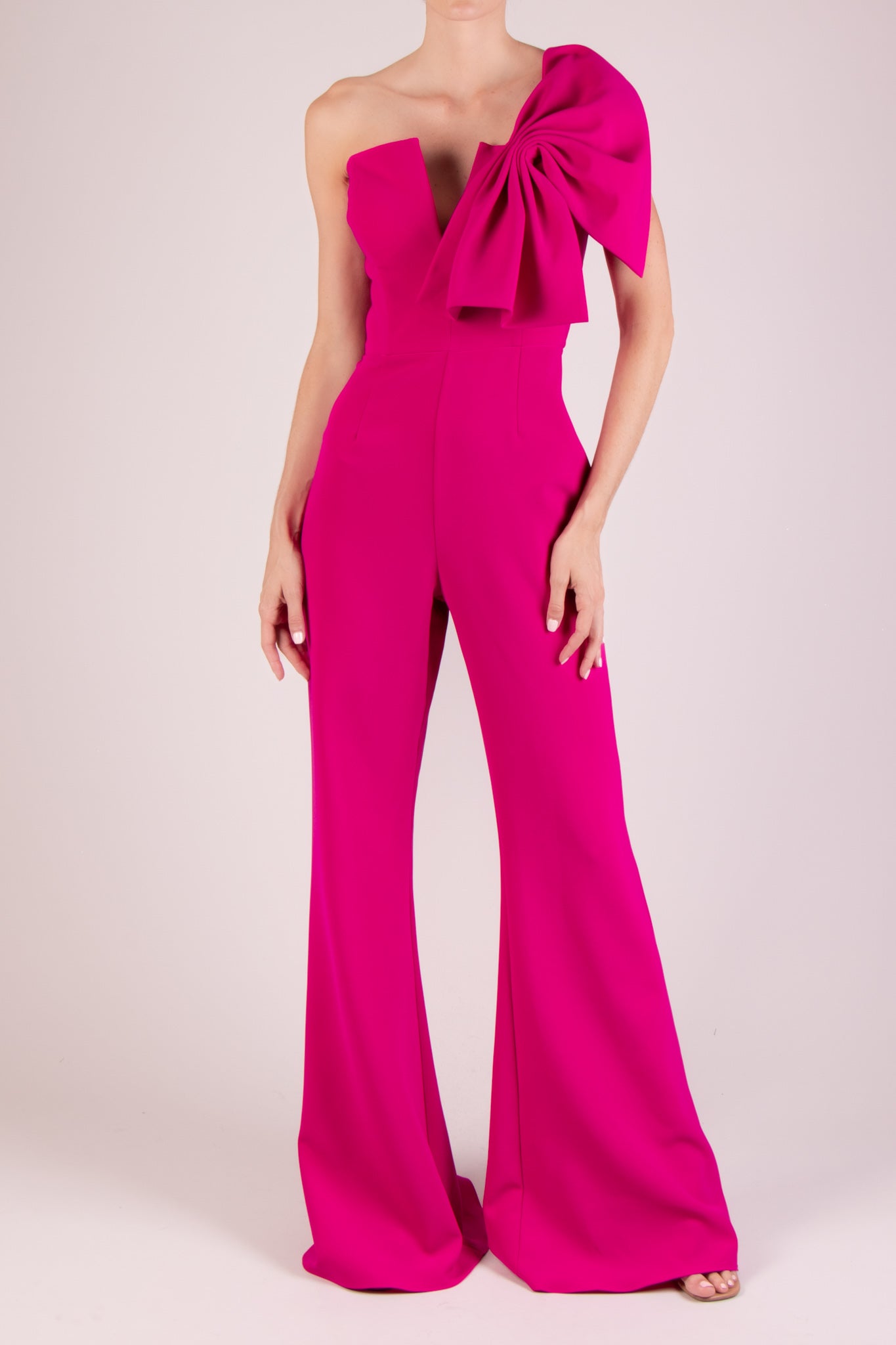 Jumpsuit detalle moño en tirante fucsia